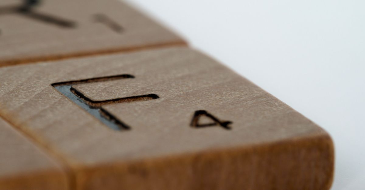 A close-up of scattered letter tiles