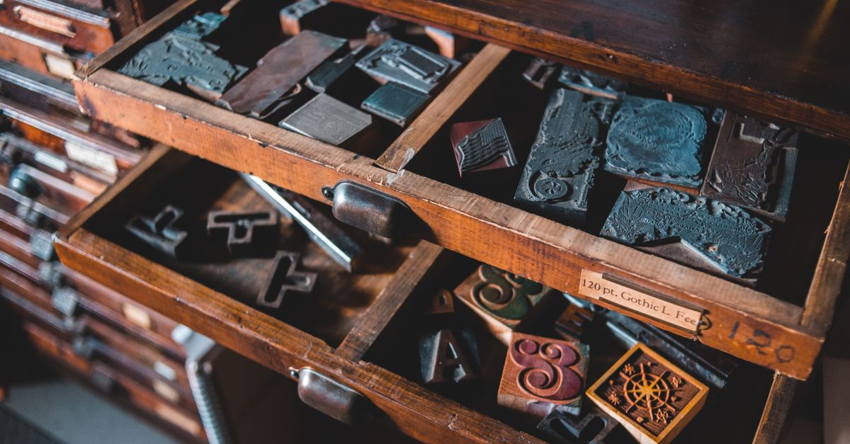 Metal letterpress type representing multi-word anagrams