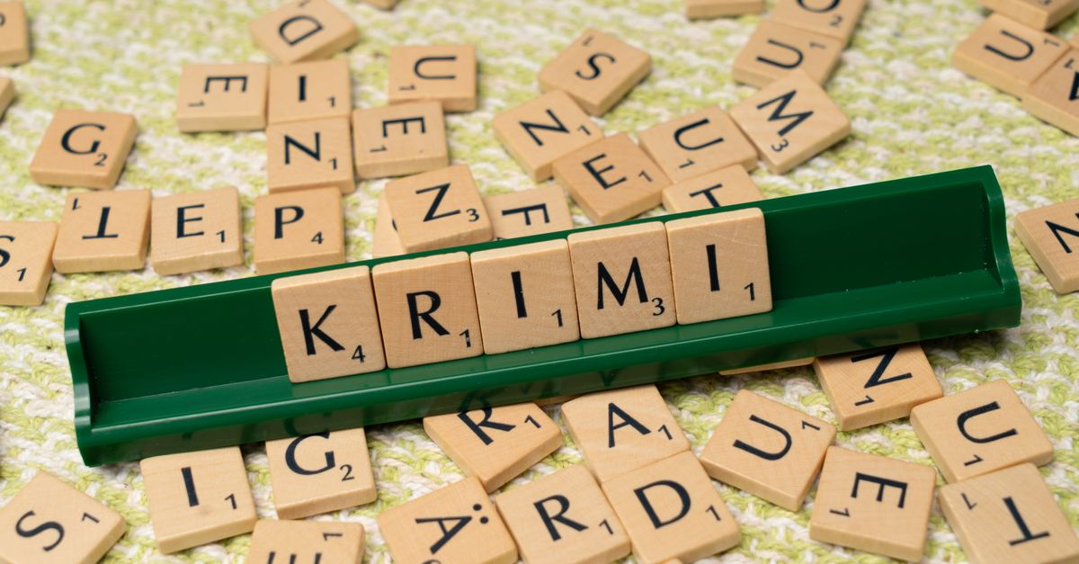 A rack of wooden letter tiles ready for a word game