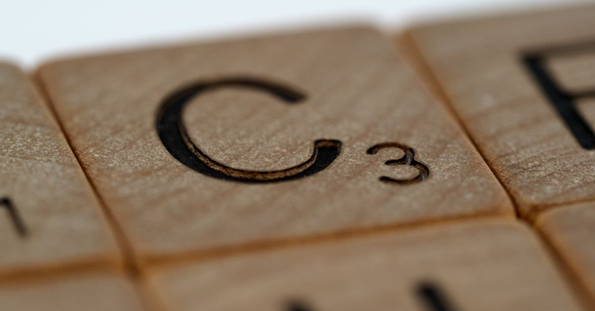 A close-up of scattered letter tiles