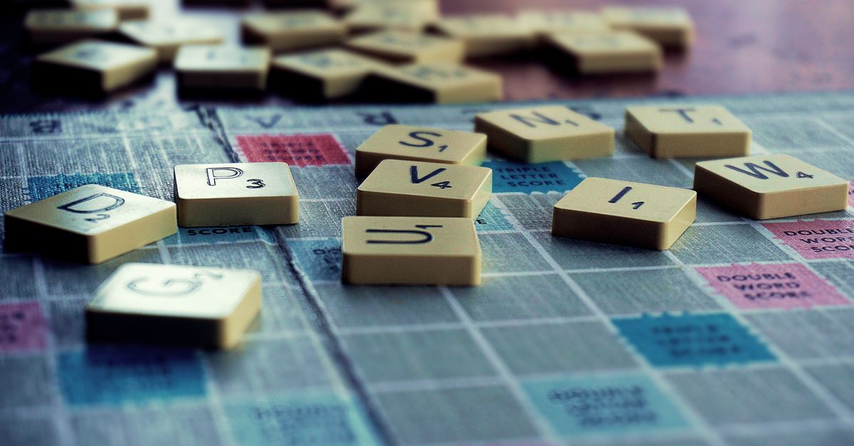 Scrabble tiles on a board with double-word and triple-letter premium squares